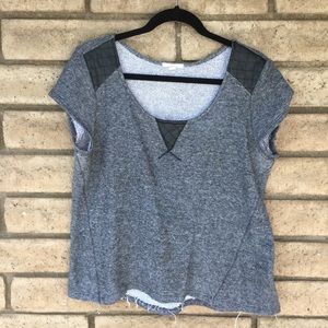 Super cute top with pleather detailing